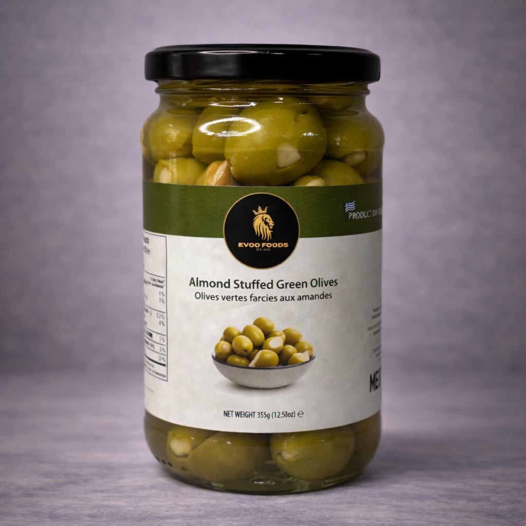 Jar of almond-stuffed green olives with a label on a gray background