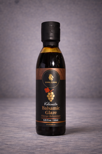 Bottle of Balsamic Glaze on a gray background
