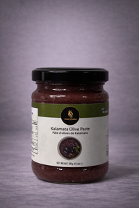 Jar of Kalamata Olive Paste on a gray background