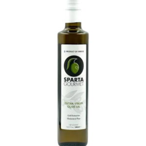 A bottle of olive oil on a green background