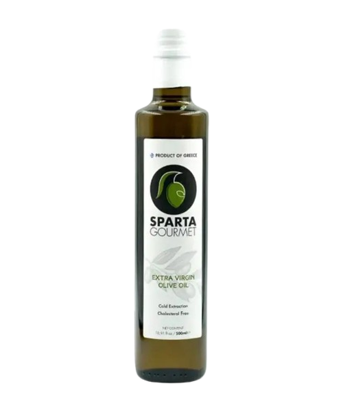 A bottle of olive oil on a green background