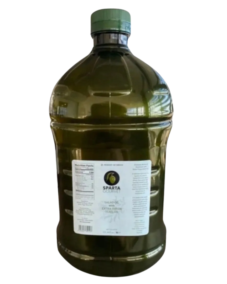 A large bottle of liquid on top of a green background.